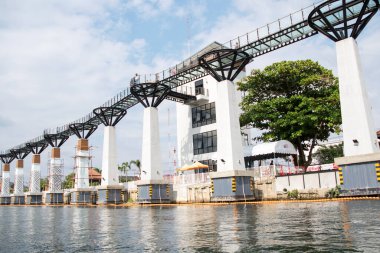 Kanchanaburi, Thailand- 16 Feb, 2023: An elevation view of the skywalk structure on the glass skywalk bridge at Kanchanaburi's newly opened landmark under a beautiful clear sky.