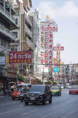 Bangkok, Thailand- 13 Feb, 2023: Busy traffic on the Yaowarat road. Yaowarat is a famous street food market in Chinatown, Bangkok.