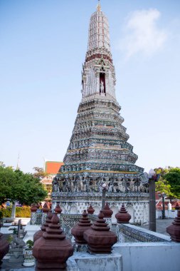 Bangkok, Thailand- 14 Feb, 2023: Impressive architectural details of Wat Arun (The Temple of Dawn) in Bangkok. This landmark of Wat Arun is a 70-meter-high temple tower, a stupa-like pagoda