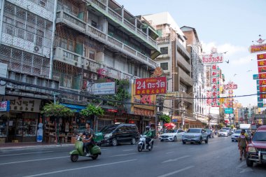 Bangkok, Thailand- 13 Feb, 2023: Busy traffic on the Yaowarat road. Yaowarat is a famous street food market in Chinatown, Bangkok.