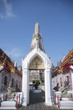 Bangkok, Thailand- 14 Feb, 2023: Impressive architectural details of Wat Arun (The Temple of Dawn) in Bangkok. This landmark of Wat Arun is a 70-meter-high temple tower, a stupa-like pagoda