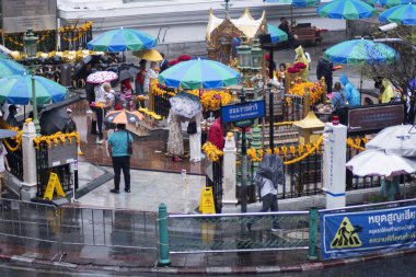 Bangkok, Thailand- 15 Feb, 2023: People visit to Erawan Shrine to pray for luck and fortune. Erawan Shrine is one of the most popular Hindu shrines in downtown Bangkok