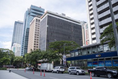 Manila, Filipinler- 15 Ekim 2023: Manila, Filipinler 'deki Makati Bölgesi' ndeki modern ofis binaları ve daireleri. Makati, Manila 'nın kalbinde yer alan hareketli bir finans bölgesidir.