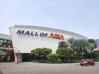 Manila, Filipinler- 17 Ekim 2023: Asya 'daki SM AVM, ya da MoA, Manila Filipinler' deki bir alışveriş merkezidir. Asya 'daki SM AVM, alışveriş standartlarını yükselten bir turizm merkezi.
