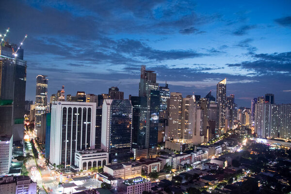 Manila, Philippines-16 Oct 2023: View of Makati Skyline during the sunset. Makati is the 1st-class highly urbanized city in Manila.