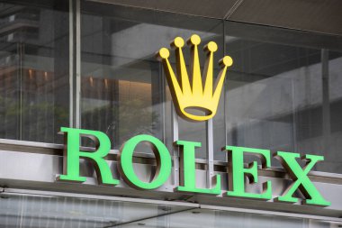 Singapur, 24 Kasım 2023, Singapur Rolex Store tabelası. Rolex SA, İsviçre 'nin Cenevre şehrinde bulunan İsviçreli lüks saat üreticisi..