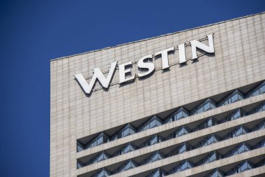 Nanjing, China- 2 Dec, 2023: Westin Hotel exterior. Westin Hotels & Resorts is an upscale hotel chain owned by Starwood Hotels & Resorts Worldwide.