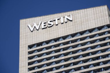 Nanjing, China- 2 Dec, 2023: Westin Hotel exterior. Westin Hotels & Resorts is an upscale hotel chain owned by Starwood Hotels & Resorts Worldwide.