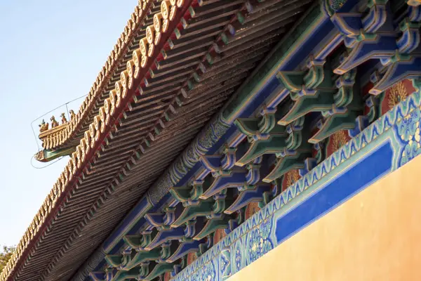 Roof structure of Chinese traditional building against the blue sky