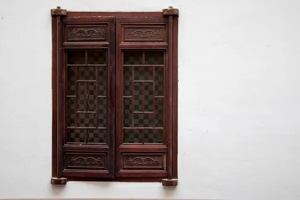 Wooden Chinese style window. Traditional window of Chinese house