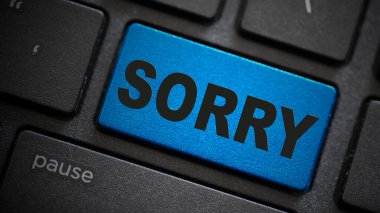 Bilgisayar klavyesinde üzgünüm metin düğmesi