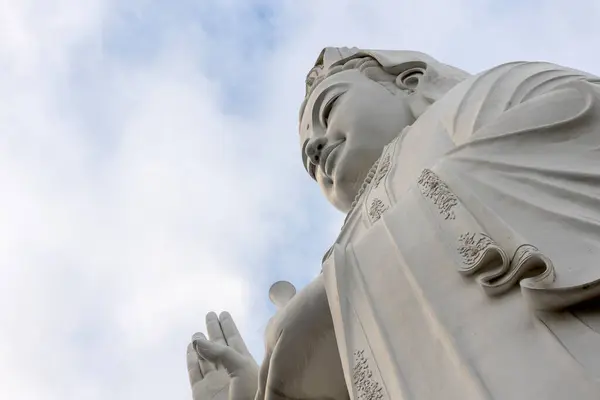 stock image Danang, Vietnam- Feb 26, 2024: Giant goddess Buddha located at Chua Linh Ung in Danang, Vietnam. Linh Ung Pagoda is situated on Son Tra Peninsula