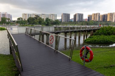 Singapore- Mar 16, 2024: Jurong Lake Gardens on the west side of Singapore. Jurong Lake Gardens is a stunning 90-hectare garden with family-friendly features clipart