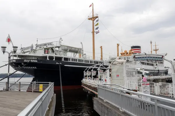 stock image Yokohama, Japan- 19 May 2024: The NYK Maritime Museum and NYK Hikawa Maru in Yokohama, Japan. It is a museum ship which is permanently docked beside Yamashita Park in Yokohama