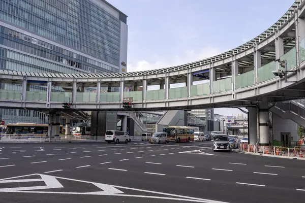 Stock image Shin Yokohama, Japan- 8 May 2024: Yokohama Kohoku junction with round overpass pedestrian walkway in Shin Yokohama, Japan