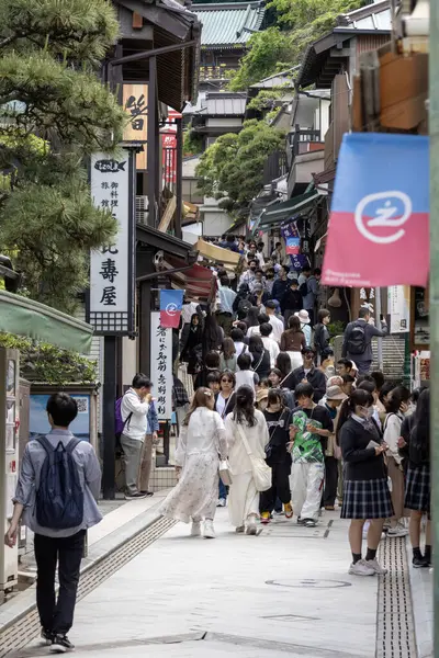 Stock image Enoshima, Japan- 14 May, 2024: Enoshima Benzaiten Nakamise Street in Enoshimo, Japan. Many souvenir shops and restaurants in the area welcome tourists daily