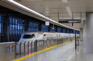 Shinagawa, Japan- 10 May 2024: Bullet train approaching to Shinagawa Station, Japan. Shinagawa Station is one of the principal transportation hubs of Tokyo. clipart