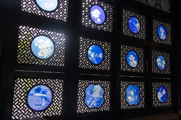 stock image Guangzhou, China- 7 Jun 2024: Decorated window in Chen Clan Ancestral Hall (Guangdong Folk Art Museum) in Guangzhou city.