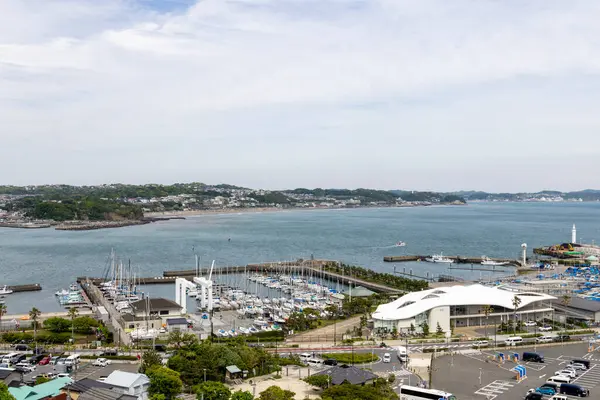 stock image Enoshima, Japan- 14 May, 2024: The view of Enoshima Yacht Harbor, Japan. This big marina with Mt. Fuji views is a popular stage for yacht races