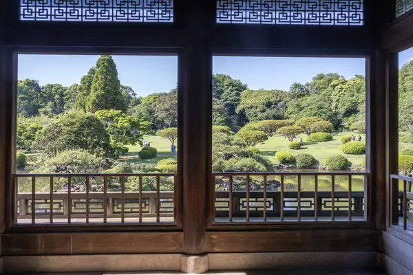 stock image Tokyo, Japan - 17 May 2024: View from Kyu Goryo Tei or Taiwan Pavilion from Shinjuku Gyoen National Garden in Tokyo. The building was a gift from Japanese people in Taiwan