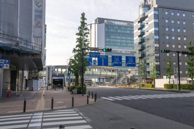 Shin Yokohama, Japan- 8 May 2024: Street view of Shin Yokohama city in Japan. Shin-Yokohama is about 10-15 train minutes from Yokohama Station  clipart