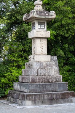 Kamakura, Japan- 14 May, 2024: Stone lantern at Dankazura pathway to Tsurugaoka Hachimangu shrine of Kamakura,Japan clipart