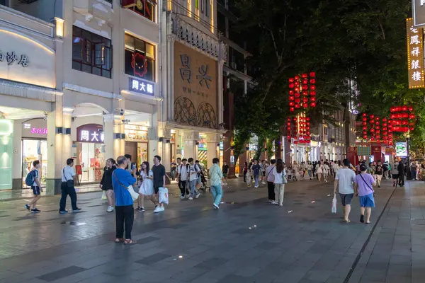 stock image Guangzhou, China- 7 Jun 2024: People walking on Beijing road walking street in Guangzhou. This street has everything on offer from well-known brands to traditional clothing