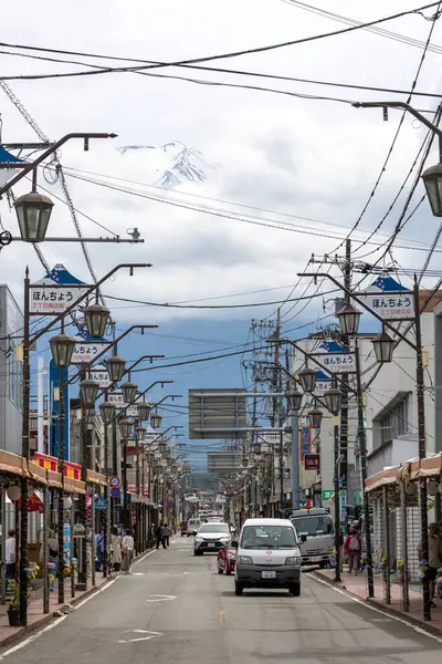 stock image Shimoyoshida, Japan- 15 May 2024: View towards Mount Fuji from Shimoyoshida Honcho Street, Japan. It is the road that connects both the city and Mt.Fuji