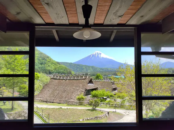 stock image Kawaguchiko, Japan- 16 May, 2024: Saiko Iyashi no Sato Nenba or Traditional Japanese Village in Kawaguchiko, Japan. This is a beautiful place to assemble ancient farm houses close to Mount Fuji