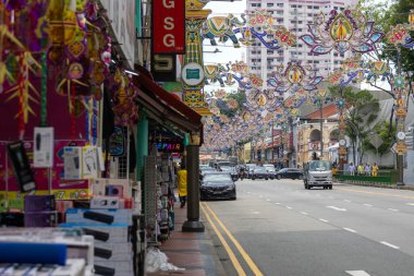 Singapore -11 Oct 2024: Colonial colorful houses with small shops in Little India in Singapore. Little India is an ethnic neighbourhood found in Singapore that has Tamil cultural elements and aspects. clipart