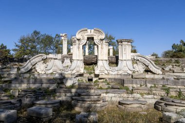 Beijing, China- 3 Nov 2024: Western house scenic spot inside Yuanmingyuan Park in Beijing, China. It is the perfect combination of European classical architecture and Chinese traditional garden art. clipart