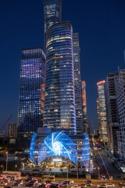 Beijing, China- 4 Nov 2024: Towers in Central Business District of Beijing with CITIC Tower super tall skyscraper on background during sunset. clipart