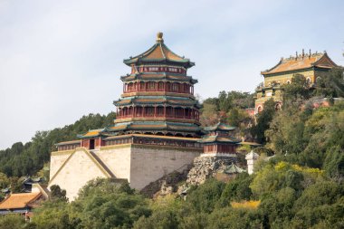 Beijing, China- 4 Nov 2024: Foxiang Ge (Tower of Buddhist Incense) at Wanshou Shan (Longevity Hill) of Summer Palace in Beijing China. clipart