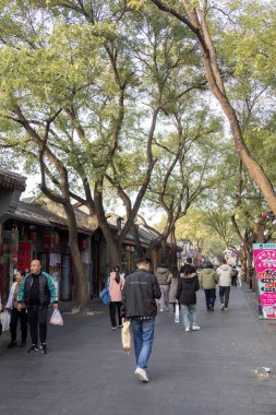 Beijing, China-12 Nov 2024: View of Nanluoguxiang in Beijing, China. It is the most popular and one of the oldest Hutongs in Beijing with a history of more than 740 years clipart