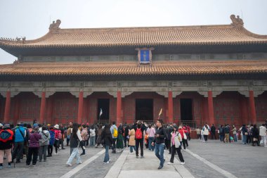 Beijing, China- 2 Nov 2024: Tourists visit to Hall of Preserving Harmony in Forbidden City,, Beijing.  It is the last one of the three main halls in the outer court clipart