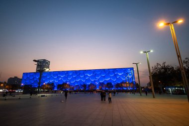 Beijing, China- 6 Nov 2024: Beijing National Aquatics Center at night in Beijing, China. The center was established for the 2008 Summer Olympics and Paralympics. clipart