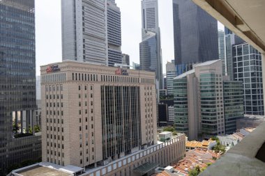 Singapur - 1 Ağustos 2025: gündüz vakti Singapur şehir merkezi manzarası. Singapur 'un ana ticaret ve finans merkezi konumundadır..