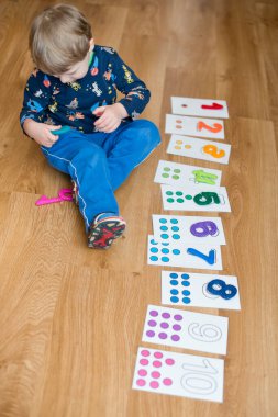 Hand made stuffed felt numbers from 1 to 10 in different colors. Safe eco stuffed toy for infants and toddlers. Early education. Learning colors and to count from zero to ten. Early education.