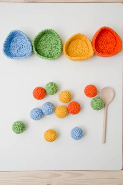 Crochet safe toys gift idea for babies. Easter colored ball sorting game for Kids. preschool education. coordination of movements, fine motoric skills