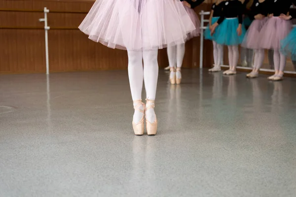 ballet dancer in ballet shoes. ballet dancers in ballet class