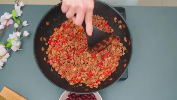 Female Hands Stir Chili Con Carne Deep Frying Pan Kitchen — Stock Video