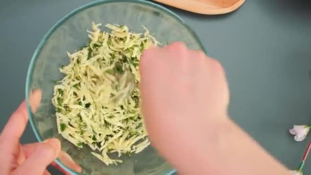 Female Hands Mix Yellow Grated Cheese Chopped Dill Spoon Kitchen — Stock Video