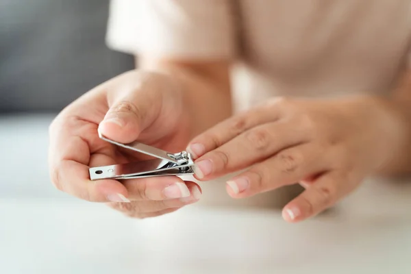Woman Cutting Fingernails Using Nail Clipper Healthcare Beauty Concept — Stock Photo, Image