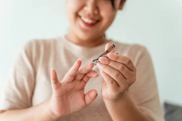 Woman Cutting Fingernails Using Nail Clipper Healthcare Beauty Concept — Stock Photo, Image