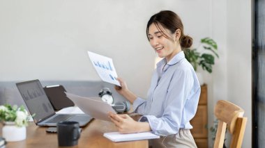 Work from home, College student is analyzing data or doing homework assignments in her house, Use your laptop to search for information and educate yourself at home, Stay home, Internet learning.