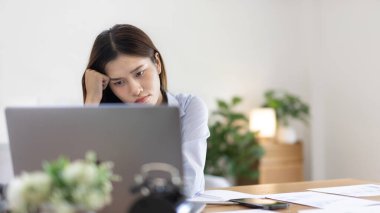 Young woman stressed or worried about doing a wrong job, Despair or disappointment, Sad feeling, Suffering, Desperate, Hopeless, Fail, disastrous, bankrupt, Scared, panicky, Failure of life.