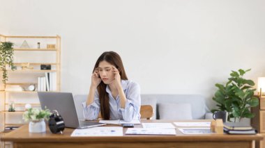 Young woman stressed or worried about doing a wrong job, Despair or disappointment, Sad feeling, Suffering, Desperate, Hopeless, Fail, disastrous, bankrupt, Scared, panicky, Failure of life.