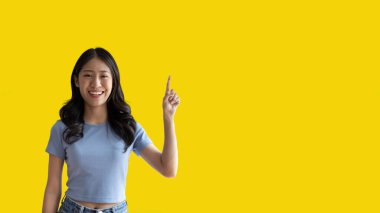 Asian woman pointing finger inviting click here, It is recommended to follow this direction or click on this link, Space for promotion here, Register or apply for membership, Click here.