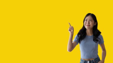 Asian woman pointing finger inviting click here, It is recommended to follow this direction or click on this link, Space for promotion here, Register or apply for membership, Click here.