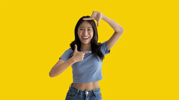 Playful Young Asian Woman Good Mood Posing Photo Photo Frame — Stock fotografie